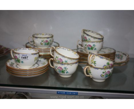A Minton tea service including two bread and butter plates, twelve tea plates, seven saucers and eight cups (one as found) no