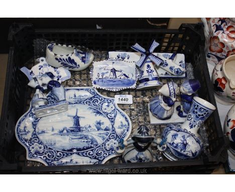 A quantity of blue and white Delftware vases and figurines, etc.