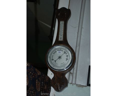A banjo wall barometer.