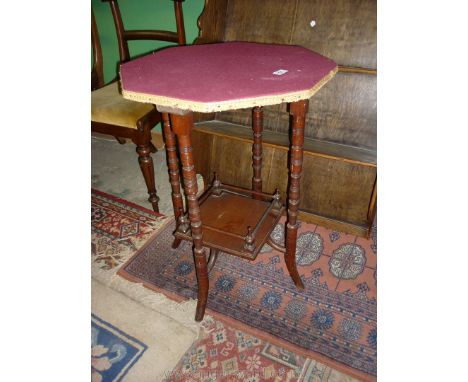 An unusual Edwardian Mahogany octagonal topped Card Table with deep pink coloured baize top and standing on turned legs, the 