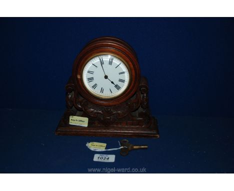 A 1920's Oak Mantle Clock, with key