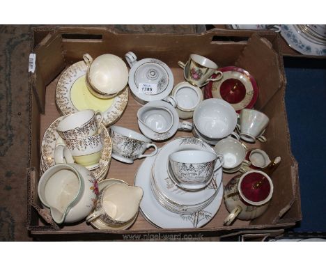 A yellow and gold part tea service, a Japanese coffee service and a foreign part Teaset in gold and white.