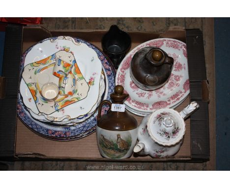 A quantity of plates including Royal Doulton, Spode, two Montrose Scotland handcrafted decanters with stoppers having grouse 