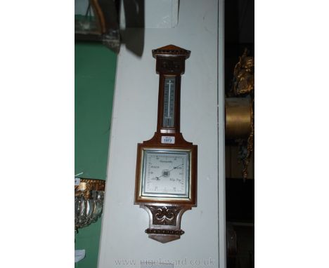 A wall Barometer.