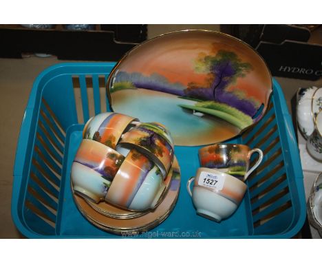 A Noritake Teaset comprising six cups, three saucers, five tea plates, bread and butter plate.