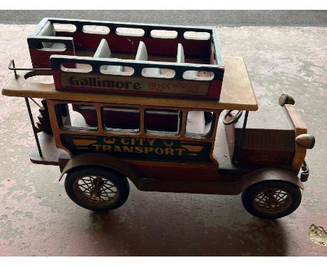 A vintage wooden model bus 