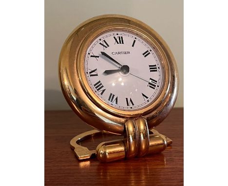A Cartier Paris Colisee quartz travel clock.