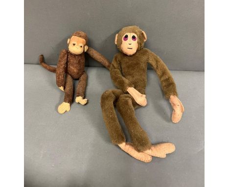 A vintage French monkey plush soft toy with jointed arms and legs along with a monkey with metal arms and legs 