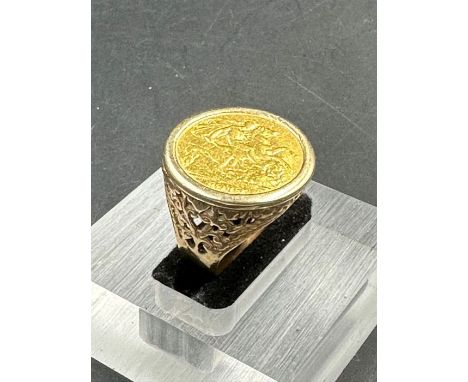 A 1913 Half Sovereign ring on a gold setting