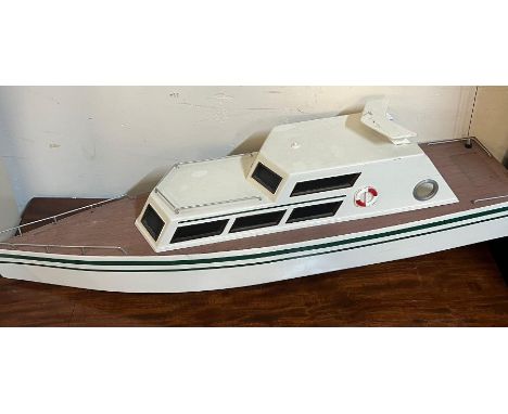 A model motor boat (90cm x 34cm)