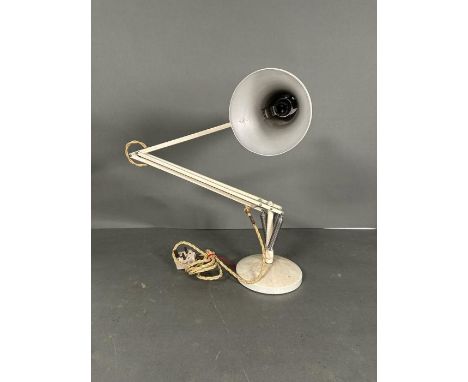 A vintage white anglepoise lamp 