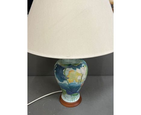 A painted table lamp 