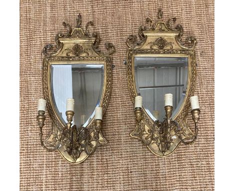 A pair of Victorian gilt gesser three branch girondelles in the manner of Robert adams of shield shape with scroll and finial