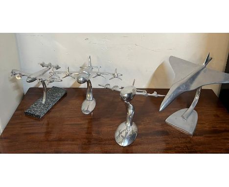 Four chrome desk top model planes 