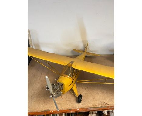 A yellow model plane (120cm x 170cm)