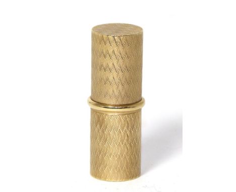 A 9ct gold cylindrical lipstick/ holder with engine turned engraving 
