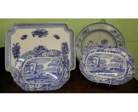 A Copeland floral decorated ceramic tray, an 18th century blue and white floral decorated charger (large riveted repair) and 