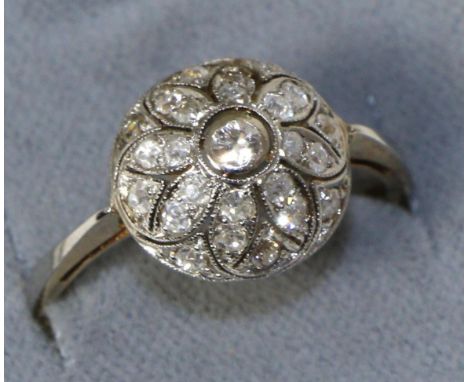 An old cut diamond cluster ring, total estimated diamond weight 0.55 carat approximately, finger size P1/2The ring is in good