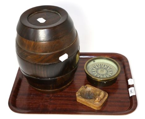 A Robert 'Mouseman' Thompson ashtray, a Remy Martin games compendium in the form of barrel and a brass compass signed J.W.Bla