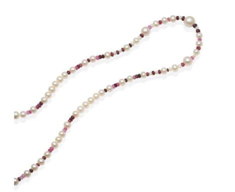 A cultured pearl and ruby bead necklace, faceted ruby beads spaced at intervals by groups of graduated cultured pearls, lengt