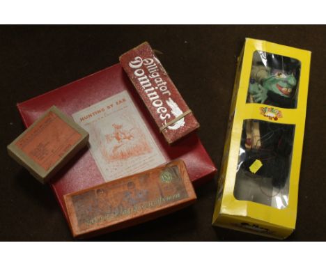 A PELHAM PUPPET TOGETHER WITH A QUANTITY OF VINTAGE GAMES 
