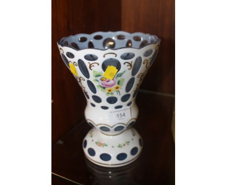 AN UNUSUAL GLASS AND CERAMIC VASE
