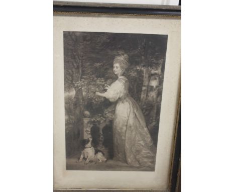 A FRAMED AND GLAZED MEZZOTINT OF A PORTRAIT OF A LADY WITH DOG