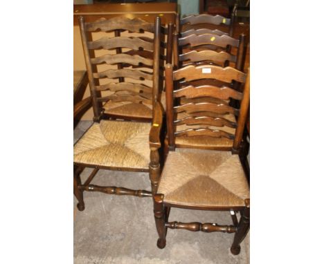 A SET OF FIVE OAK LADDER BACK WICKER SEAT DINING CHAIRS