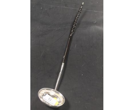 A GEORGIAN WHITE METAL LADLE WITH MARINE HANDLE