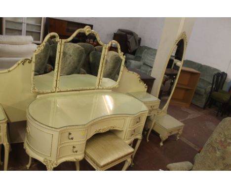 A WHITE QUEEN ANNE STYLE BEDROOM SUITE CONSISTING OF A DRESSING TABLE, INTEGRATED HEADBOARD AND BEDSIDE CABINETS, TOGETHER WI