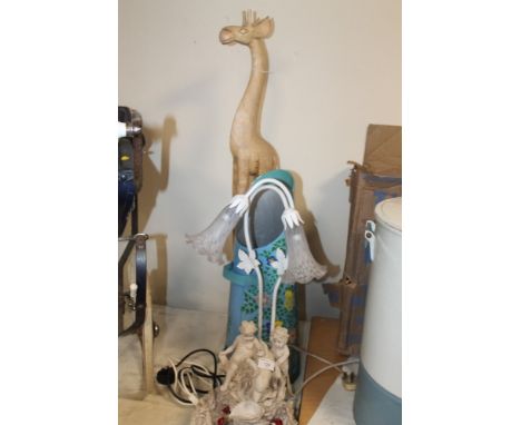 AN DECORATIVE LAMP, TOGETHER WITH A COAL BUCKET AND WOODEN GIRAFFE 