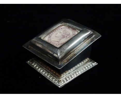 Silver - A silver stamp box, the hinged lid with a Penny Lilac under a glazed panel, Birmingham 1924, height 3.5cm, 3cm x 4.5