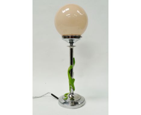 A Crystex Art Deco table lamp - A chromium plated table lamp, the column entwined with a green bakelite lizard with rose pink