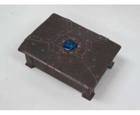 Liberty &amp; Co. style copper box - An Arts &amp; Crafts Liberty style copper box, the lid set a blue and green enamel caboc