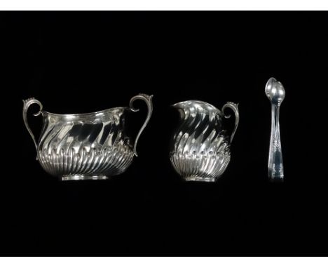 Silver - A matching silver sucrier and cream jug with part fluted decoration, Birmingham 1891, maker's mark for L. Spiers, we