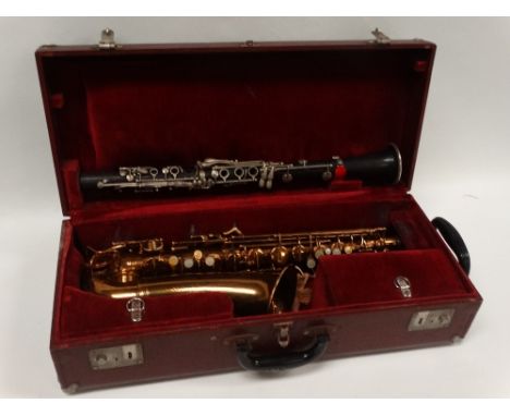 CG Conn Ltd Elkhart Inc. USA saxophone - A brass alto saxophone Reg. No.309626, impressed 6M VIII, together with a Brilliante