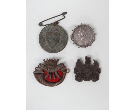 Rupee brooch, badges etc. - A Victorian silver one Rupee 1887 brooch, together with a Cornwall Light Infantry badge, a bronze