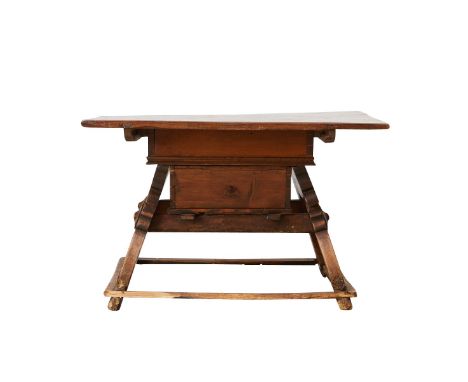 18th century Swiss farmhouse table. With a square top resting on slanted legs. A small drawer for storage and carved skirt be