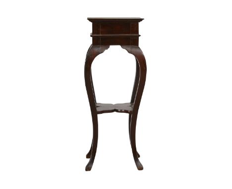 Japanese wooden side table or plant stand with gently curving legs. A carved lower shelf supports the legs.Provenance: From t