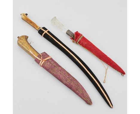 Group of three Indo-Persian kard knives including one 18th-19th c. Indo-Persian kard with rock crystal handle and a fabric sh