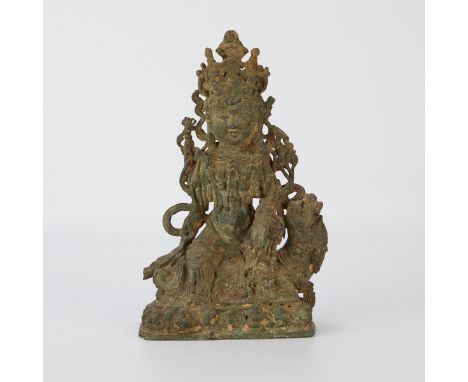 Tibetan bronze figure of Manjushri, the Bodhisattva of wisdom. He lithely rests atop a camel.Provenance: From the Estate of H