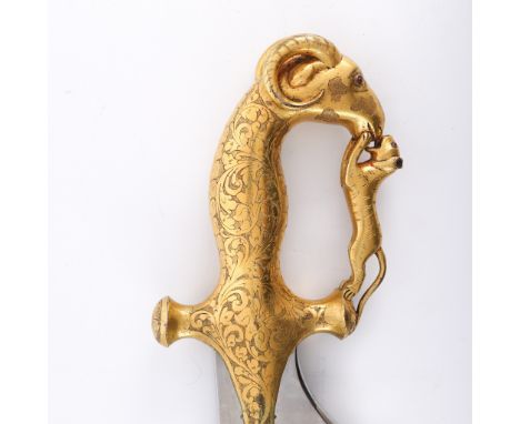 19th century Mughal Talwar style handle in the form of a gilt bronze ram's head, ornately decorated with floral filigree. A d