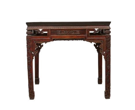 Chinese 19th c. carved wood square top table. Carved in low relief throughout with floral motifs, vines, and dragons.Provenan