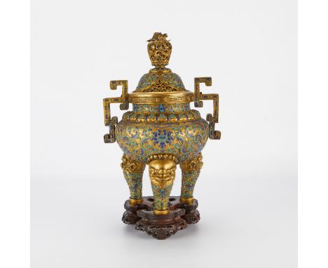 Antique Chinese enameled and gilt tripod censer with a globular form, finely enameled with a lotus flower and scrolling spand