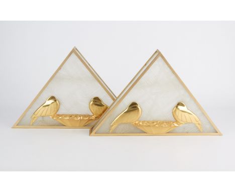 Pair of triangular Art Deco style lamps featuring brass birds resting on a nest along the face. With frosted glass impressed 