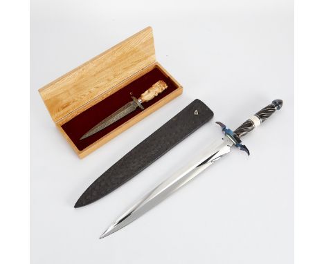 Todd Kopp (American, 20th/21st c.) Group of two steel knives. One Damascus steel blade with a carved horn handle and a custom