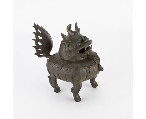 Chinese bronze censer in the form of a foo dog. The hinged head detaches.Provenance: From the Estate of Horst Rechelbacher, O