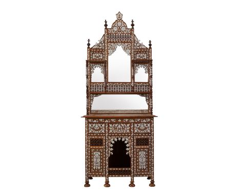 Syrian mother of pearl inlaid wooden dressing table with mirrors. The intricately carved wood is inlaid with floral designs i