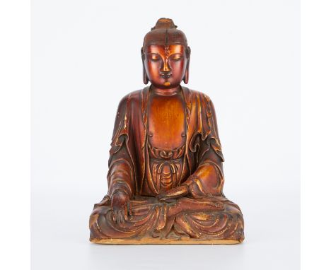 Chinese Qing dynasty polychrome wood carving of the Buddha. Featuring a serene seated figure in flowing robes retaining much 