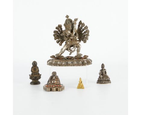 Group of five Tibetan and Chinese Buddhas. These examples are of bronze, silver, and gold.Provenance: From the Estate of Hors